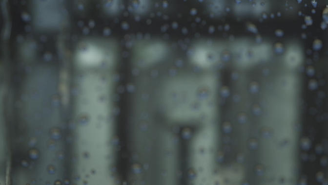 rainy window - blurred building