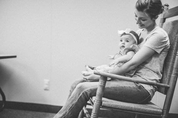 Mother Rocking Her Infant Daughter